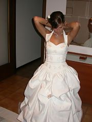Photo 1, Bride takes her