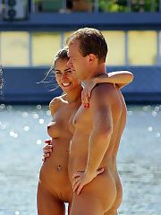 Photo 3, Nudist couples sunbathing