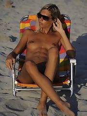 Photo 2, Nudist girls sunbathing